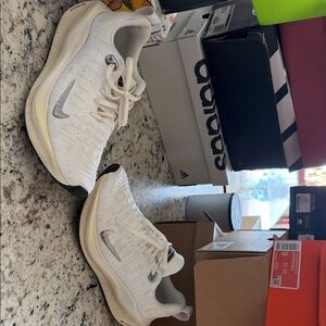 Nike White Running Sneakers with Metallic Details